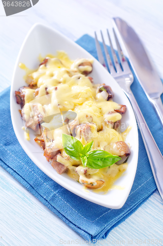 Image of fried meat with mushroom and cheese