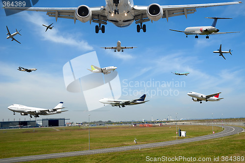 Image of Air travel - Plane traffic in airport at rush hour