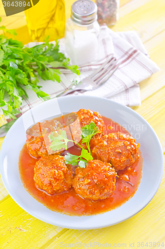 Image of meat ball with tomato sauce