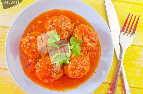 Image of meat ball with tomato sauce
