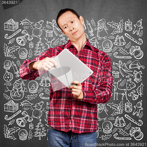 Image of Man Looking For Christmas Gifts