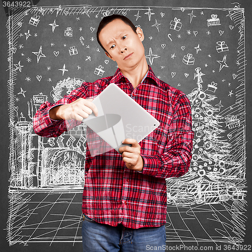 Image of Man Looking For Christmas Gifts