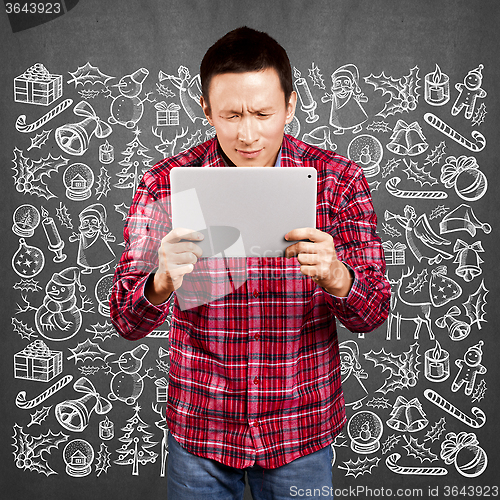 Image of Man Looking For Christmas Gifts