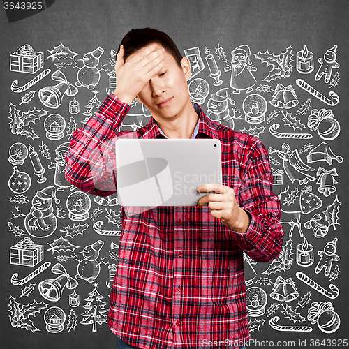 Image of Man Looking For Christmas Gifts