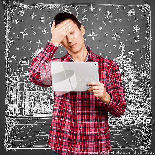 Image of Man Looking For Christmas Gifts