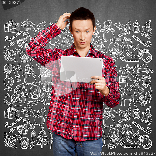Image of Man Looking For Christmas Gifts