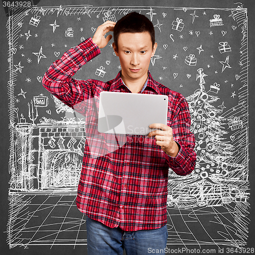 Image of Man Looking For Christmas Gifts
