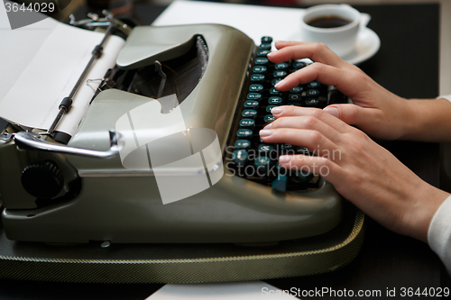 Image of typewriter woman hands