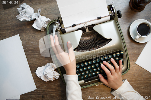 Image of Vintage typewriter and white paper