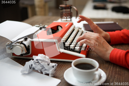 Image of Side view of typewriter on desk