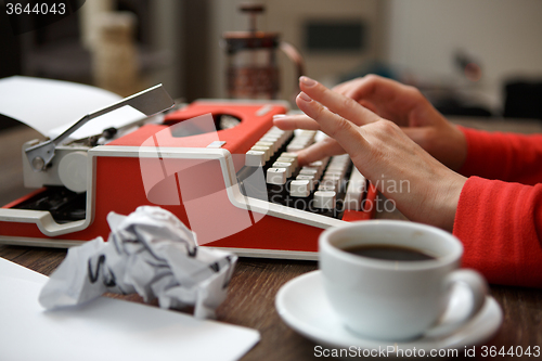 Image of Side view of typewriter on desk