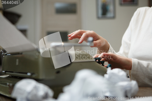 Image of typewriter with crumpled paper