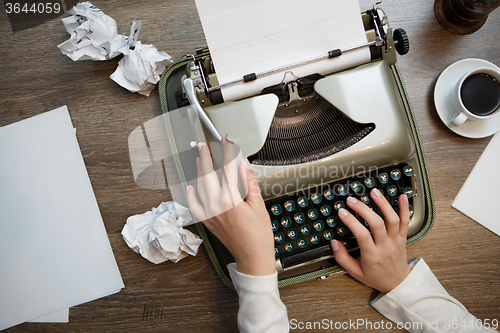 Image of Vintage typewriter and white paper