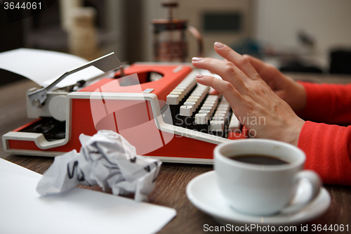 Image of Side view of typewriter on desk