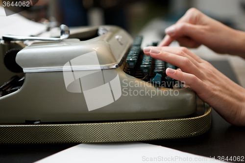 Image of typewriter woman hands