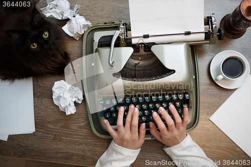 Image of Vintage typewriter and white paper