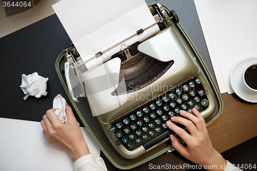 Image of Vintage typewriter and white paper