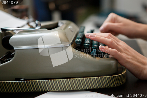 Image of typewriter woman hands