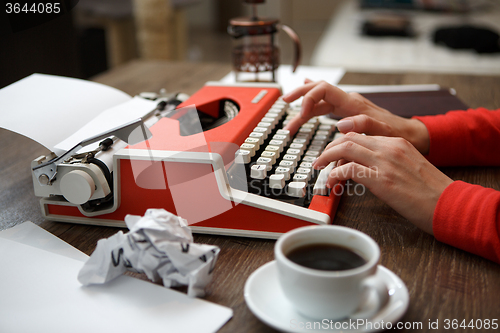 Image of Side view of typewriter on desk