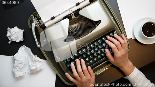 Image of Vintage typewriter and white paper