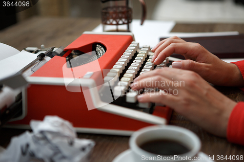 Image of Side view of typewriter on desk