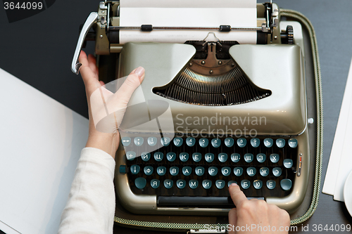 Image of typewriter woman hands