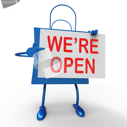 Image of We\'re Open Sign on Bag Shows New Store Launch Or Opening