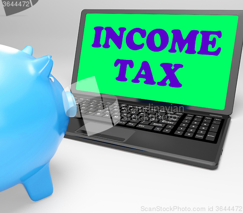 Image of Income Tax Laptop Means Taxation On Earnings