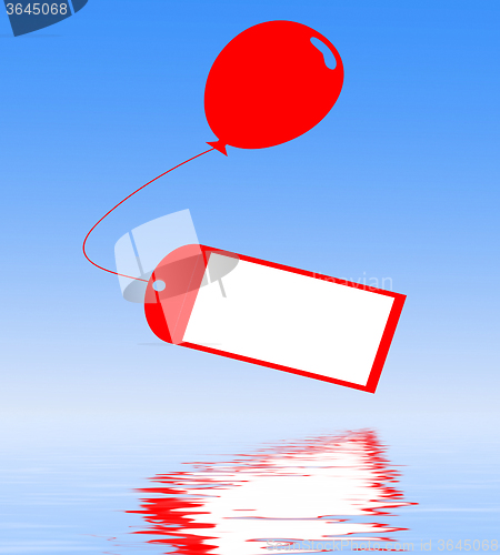 Image of Card Tied To Balloon Displays Greeting Card Or Party Invitation