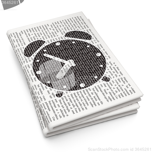 Image of Time concept: Alarm Clock on Newspaper background