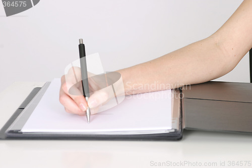 Image of Woman writing