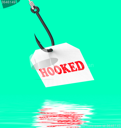 Image of Hooked On Hook Displays Fishing Equipment Or Catch