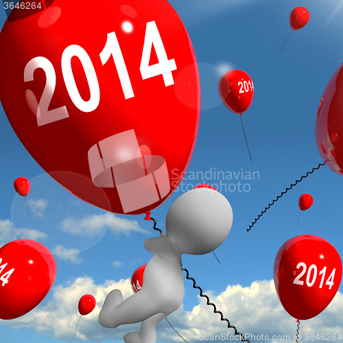 Image of Two Thousand Fourteen on Balloons Shows Year 2014