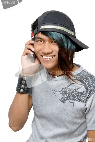 Image of Asian punker calling by cell phone