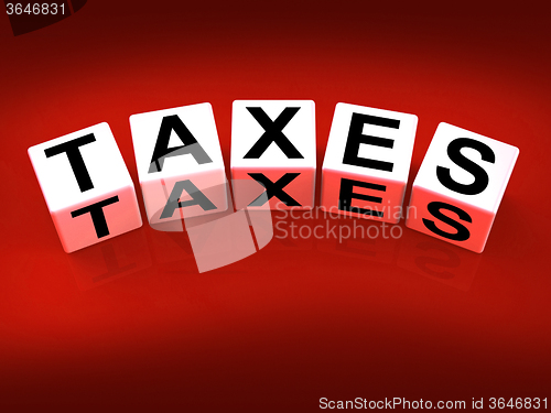Image of Taxes Blocks Represent Duties and Taxation Documents