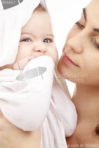 Image of happy in mother hands
