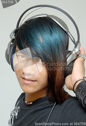 Image of Asian punker portrait with headphones