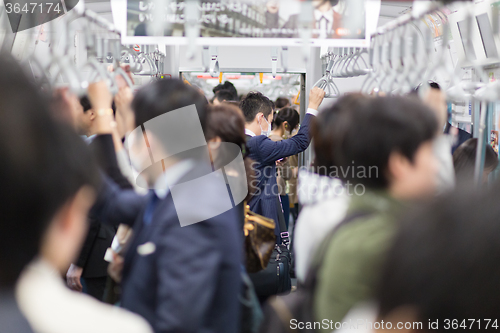 Image of Passengers traveling by Tokyo metro.