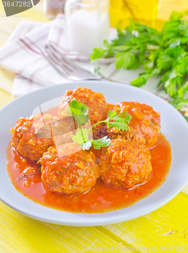 Image of meat ball with tomato sauce