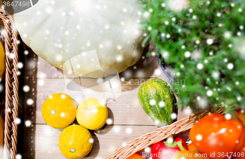 Image of vegetables in baskets on table at market or farm