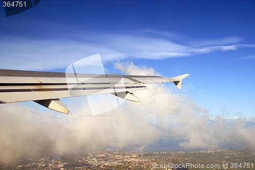 Image of Take-off over Asian city