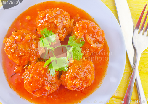 Image of meat ball with tomato sauce