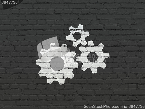 Image of Marketing concept: Gears on wall background