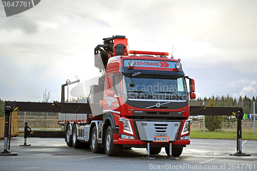 Image of Red Volvo FM Truck equipped with Heavy Crane