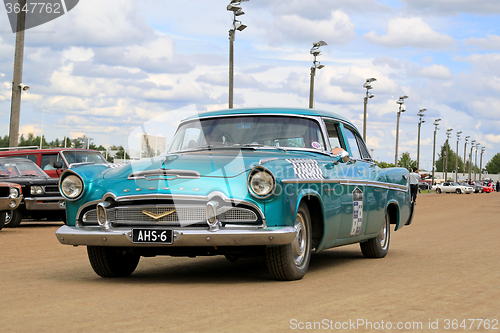 Image of Turquoise Desoto Firedome Classic Car on a Show