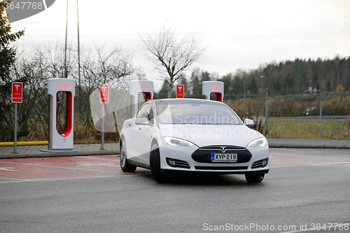 Image of Tesla Model S Electric Car Leaves Supercharger Station