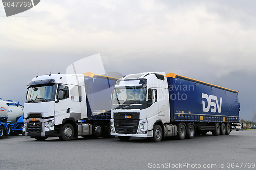 Image of White Volvo FH and Renault Trucks T on a Yard