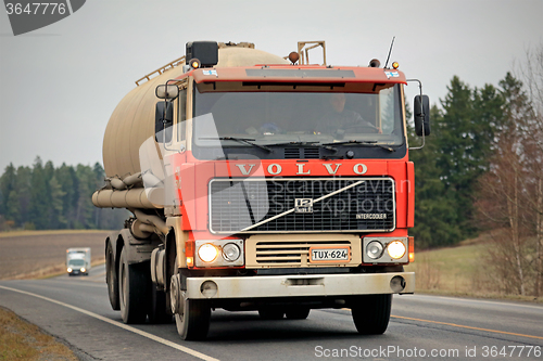 Image of Red Volvo F12 Tank Truck on the Road