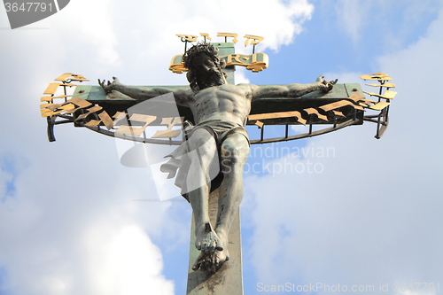 Image of crucifix and blue sky 