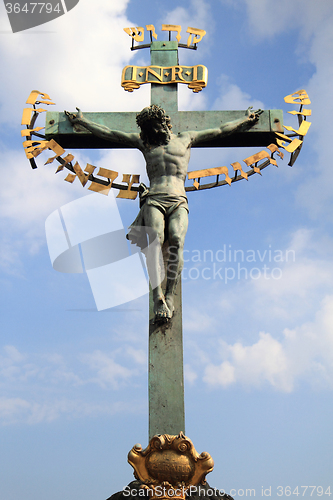 Image of crucifix and blue sky 